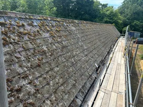 Historic stables new slate roof