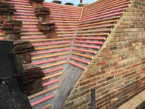Re-roofing of historic peg tile roof