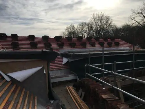 Re-roofing of historic peg tile roof