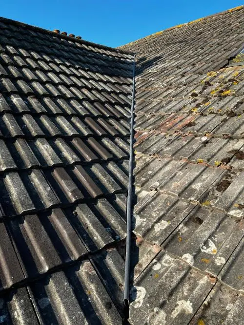 Re-roof of concrete pan tiled roof with new valley