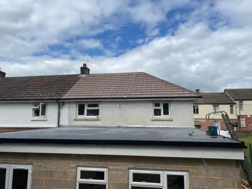 Re-roofing of main concrete pan tiled roof and new Firestone EPDM flat rubber roof