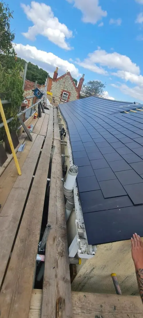 Replacement of kinked slate roof