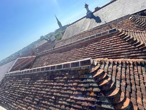 Roofing of a historic peg tile roof and all associated muck work