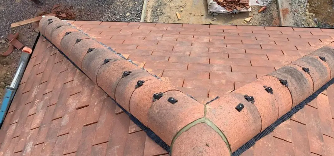 Roof tiles and slates